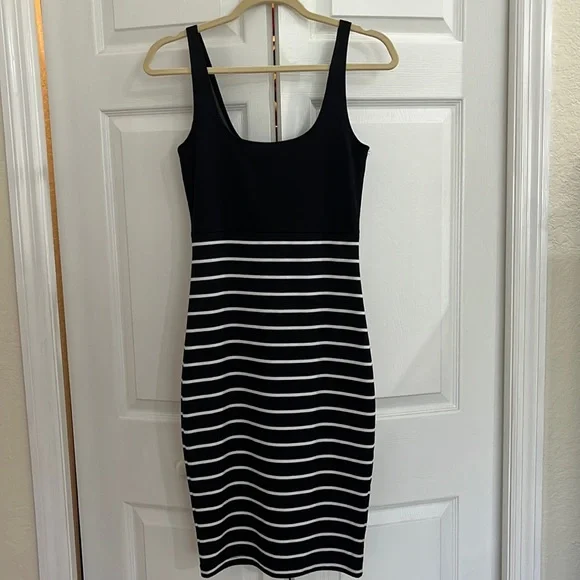 Cotton On- Size S- black bodycon dress with white horizontal stripes.